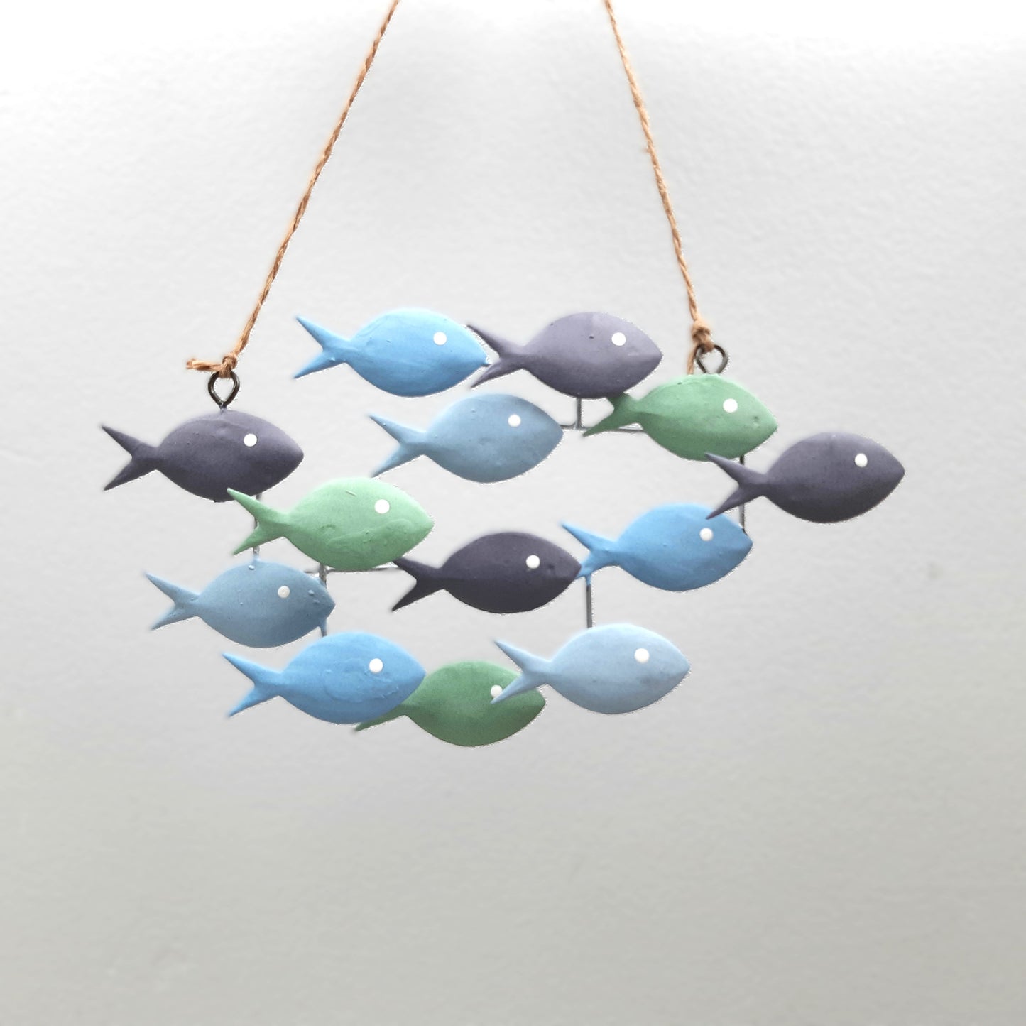 A hanging decoration of Lagoon fish in various colours of Blues and Greens