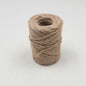 A roll of Natural Brown Jute Mossing Twine for crafting and floristry.