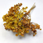 Artificial Bouquet of dried look yellow flowers on a white background