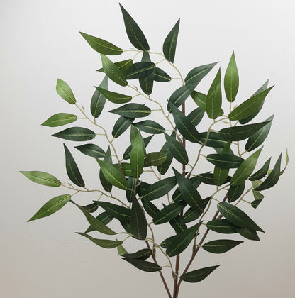 A 68cm artificial green Ruscus spray with lifelike leaves, suitable for floral arrangements and decorations.