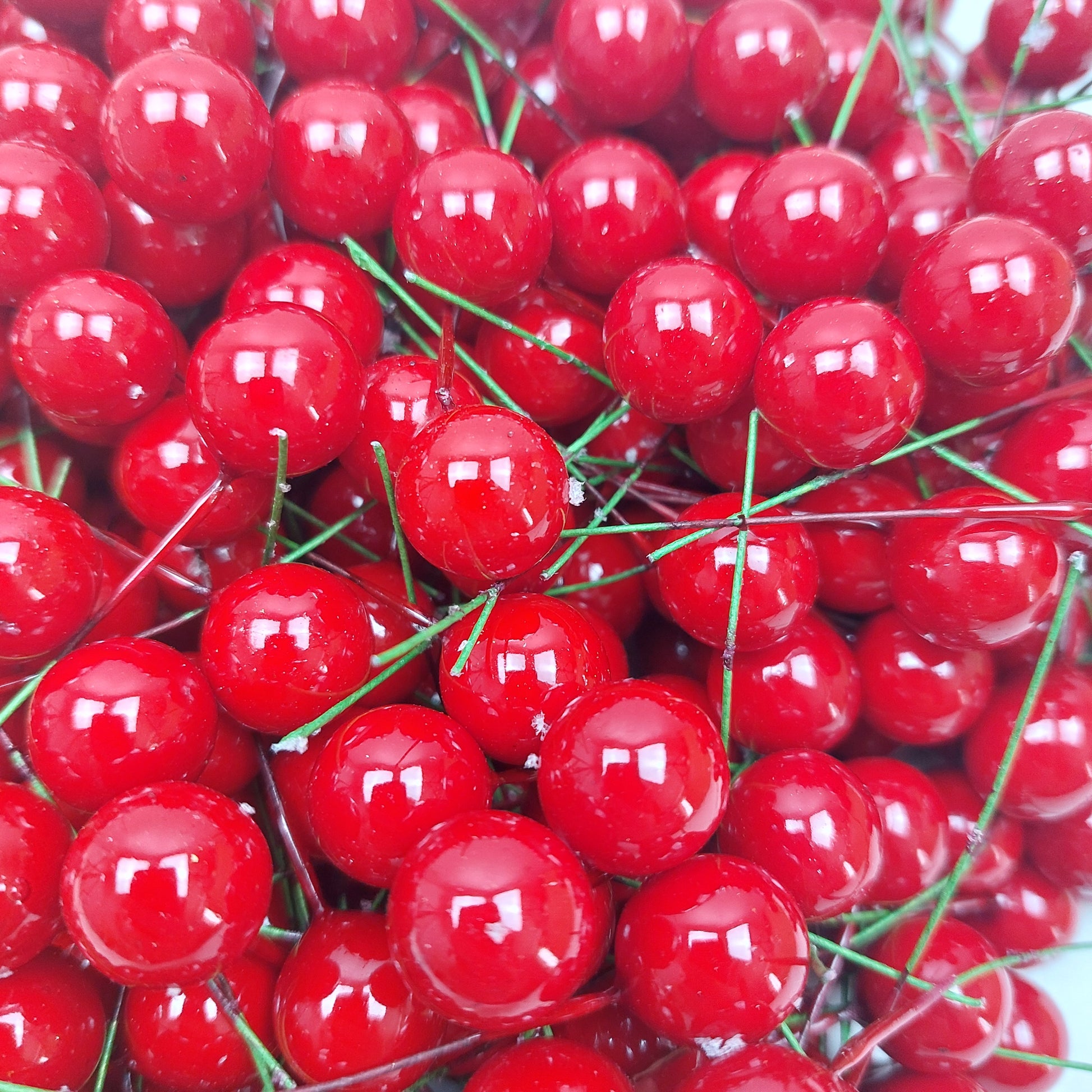 Close-up of bright red artificial berries