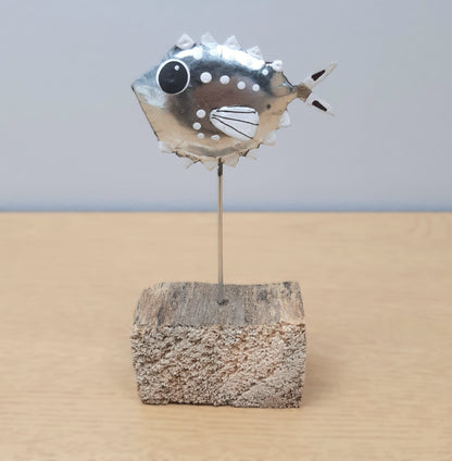 Metal Silver Fish on a wooden block