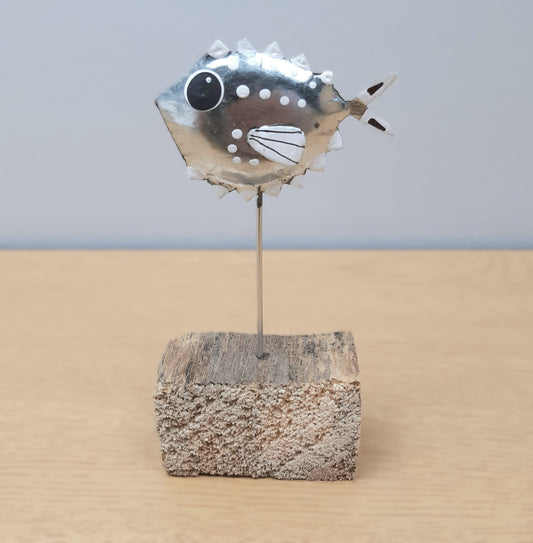 Metal Silver Fish on a wooden block