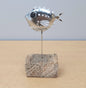 Metal Silver Fish on a wooden block