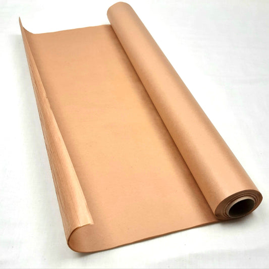Rolled-up caramel tissue paper on a white background
