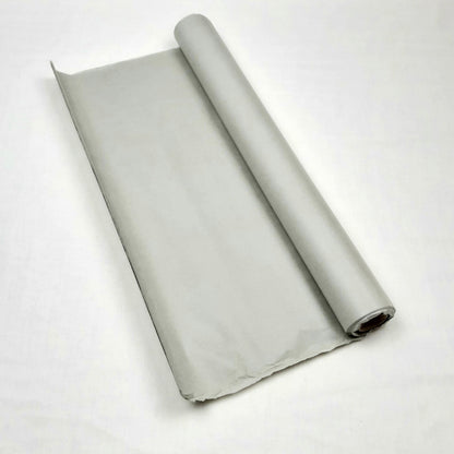 Rolled-up grey tissue paper on a white background