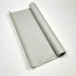 Rolled-up grey tissue paper on a white background